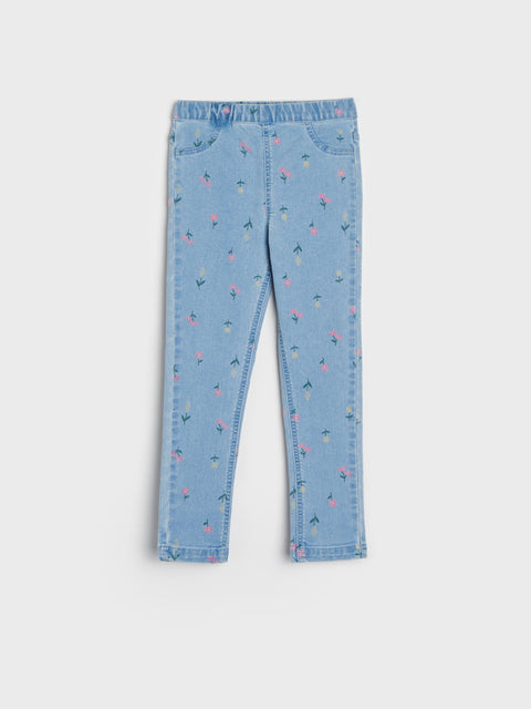 Light blue jeans with a subtle pattern on a white background