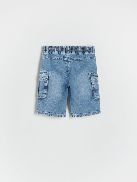 Blue denim shorts on a light gray background