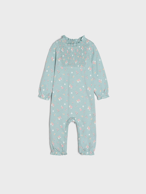 Light blue baby onesie with floral pattern on a white background
