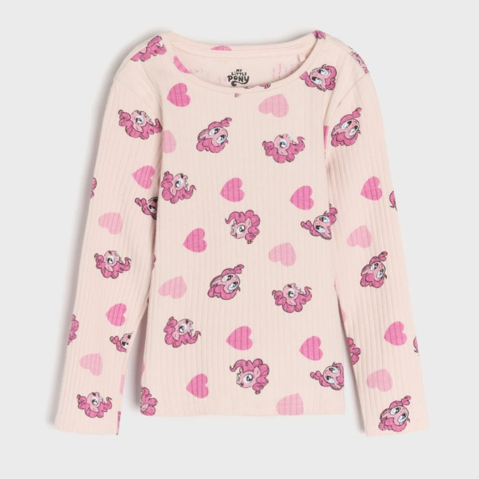 A light pink long-sleeve ribbed top with an all-over print of pink hearts and cartoon pony characters, shown flat against a light gray background.