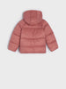 Pink puffer jacket on a light gray background