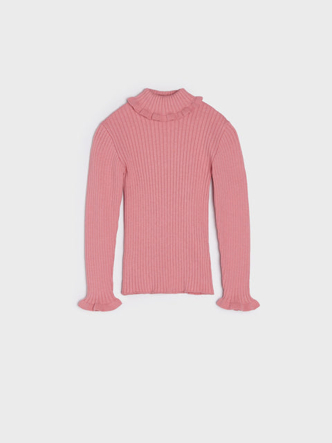 Pink ribbed sweater on a light purple background