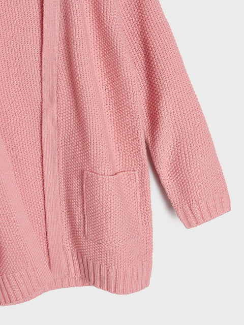 Pink knitted cardigan on a white background