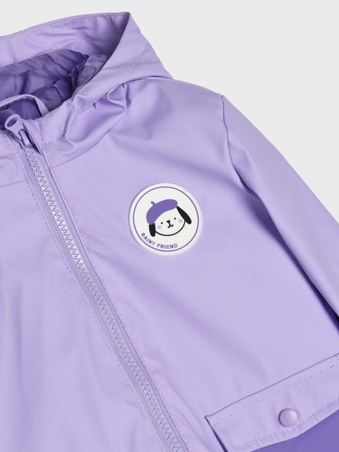 Close-up of a purple jacket with a brand logo on a white background