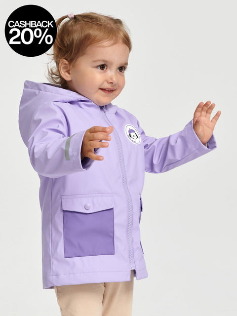 Child wearing a purple raincoat with a white background