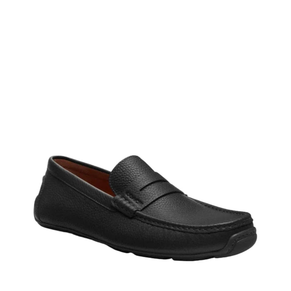 A single black pebbled leather penny loafer shown from a three-quarters angle on a plain white background.