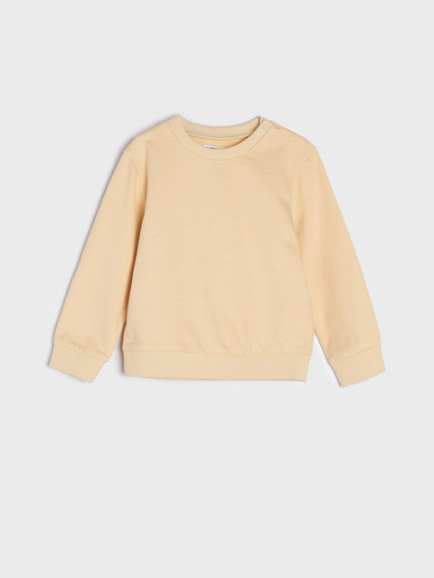 Beige sweatshirt on a light gray background