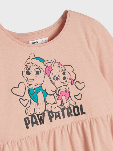 Pink dress with Paw Patrol characters and text on a white background