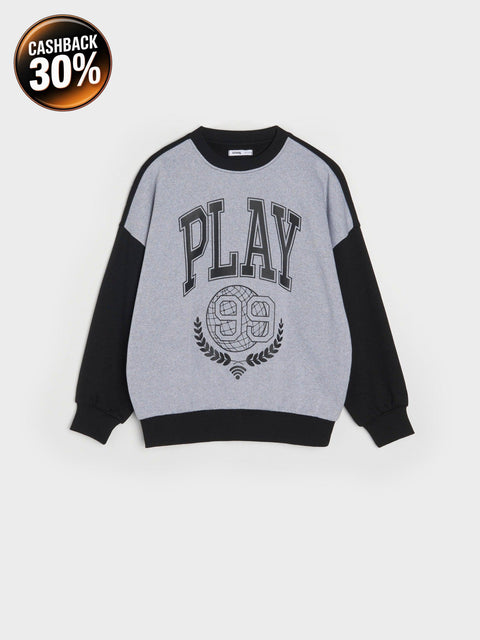 Gray sweatshirt with black sleeves and 'PLAY' text on a white background