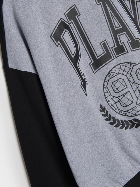 Gray sweatshirt with 'PLAY' and logo design on a white background