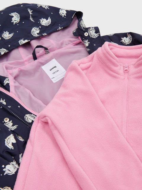 Pink garment with a navy jacket featuring white patterns on a light gray background
