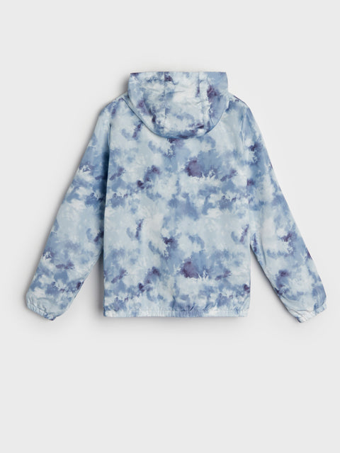 Blue and white floral-patterned jacket on a light gray background