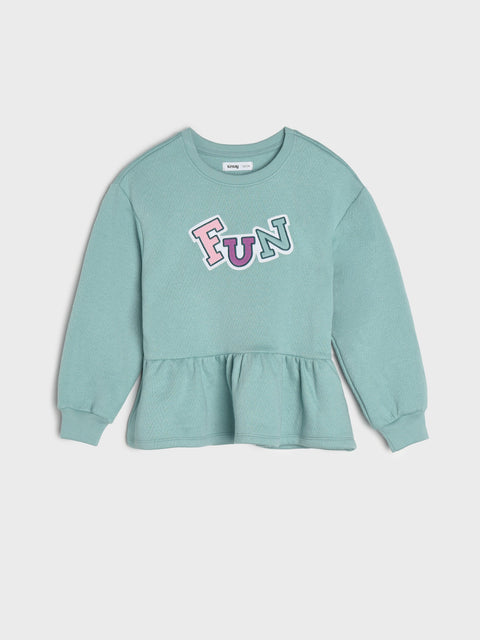 Light blue sweatshirt with 'FUN' text on a white background