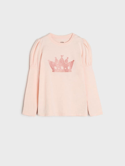 Pink long-sleeve top with a crown design on a light gray background