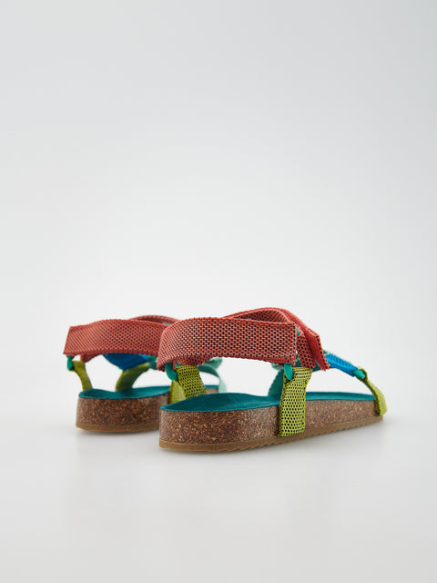Pair of sandals with colorful straps on a white background