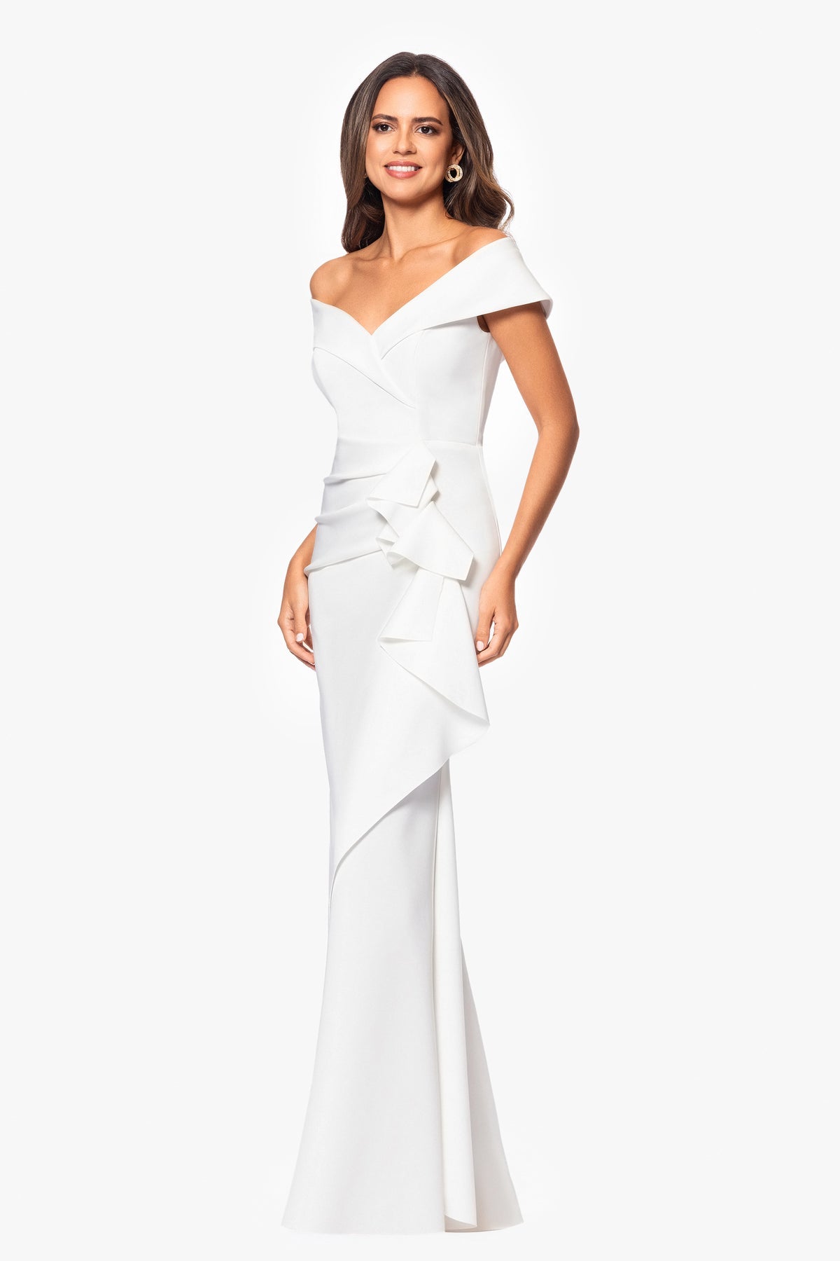 Woman wearing a white evening gown on a white background