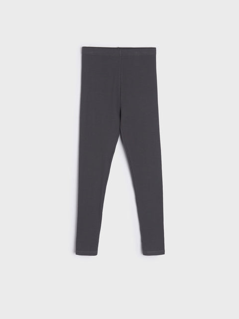 Dark gray leggings on a white background