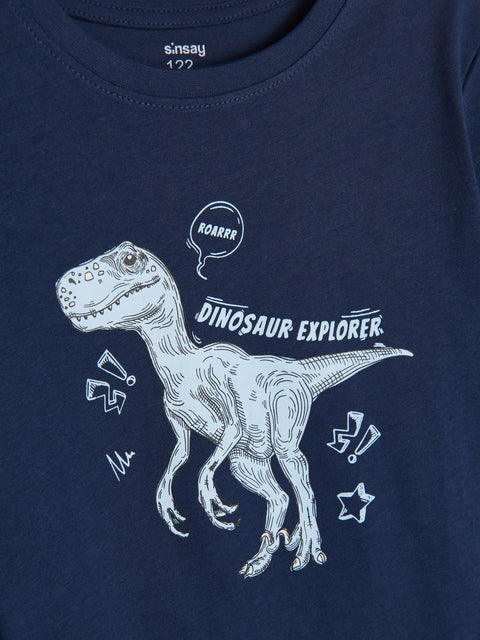 Navy blue t-shirt with a white dinosaur graphic and 'Dinosaur Explorer' text on a plain background.