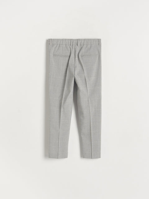Gray checkered pants on a light gray background