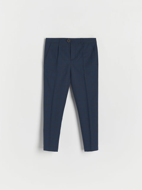 Navy blue pants on a light gray background