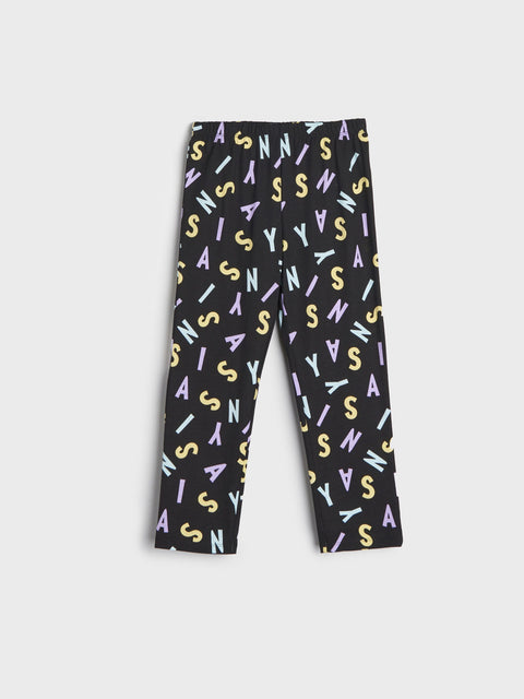 Black leggings with colorful letter pattern on a white background
