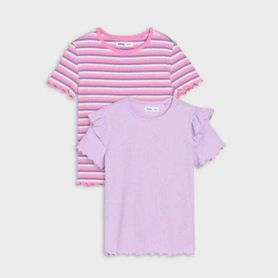 Two children's short-sleeve tops from ALOHA on a light gray background. The back top is pink, purple, and blue horizontally striped with ruffle trim.