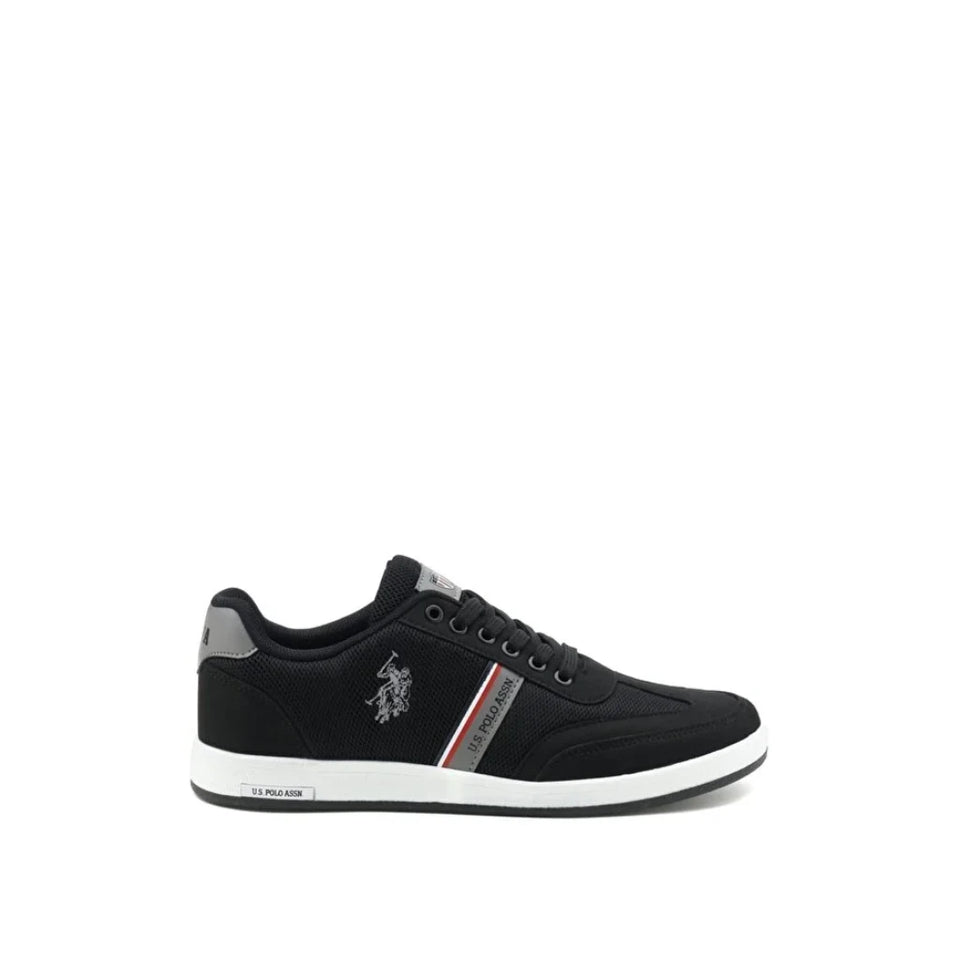 A black low-top sneaker with a white midsole, featuring a gray heel tab, a diagonal red and white stripe on the side, and a silver embroidered polo player logo on the side panel.