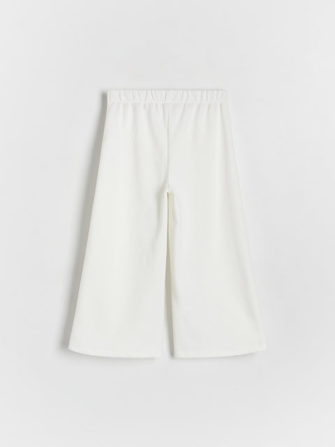 White shorts on a light gray background