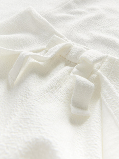 Close-up of textured white fabric