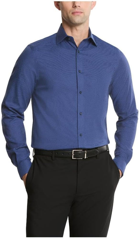 Man wearing a blue patterned shirt and black pants on a white background