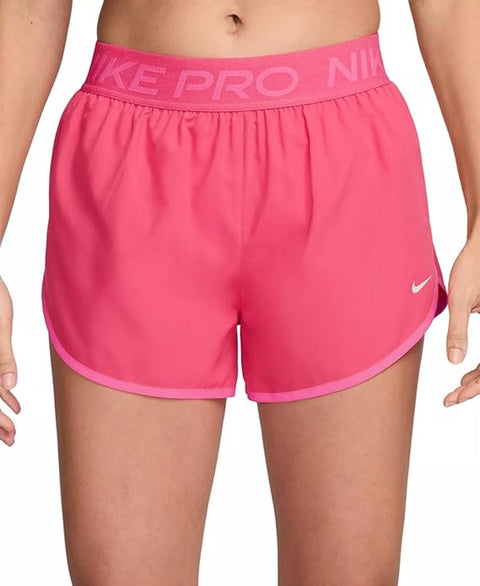 Pink Nike Pro shorts on a person against a white background