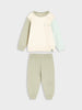 Children's pajama set with long-sleeve top and pants on a light gray background