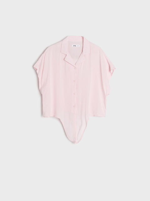 Pink sleeveless top on a light gray background