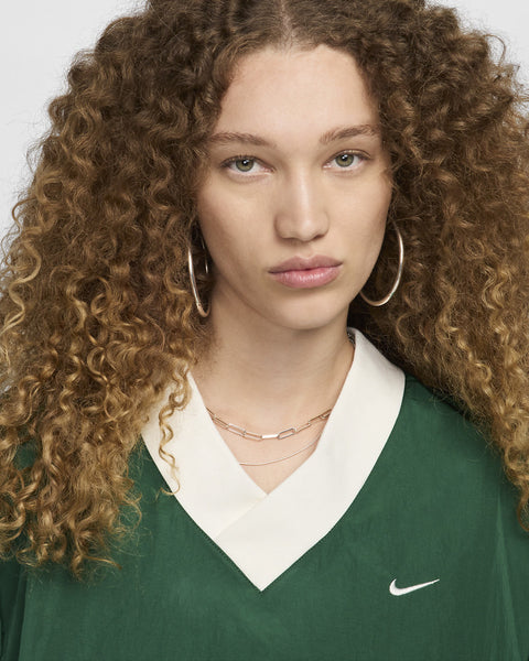 Nike Women's Green Sportswear Essential Loose UV Woven Long-Sleeve V-Neck Blouse | Nike In Lebanon