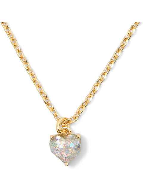 Gold necklace with a heart-shaped pendant on a white background