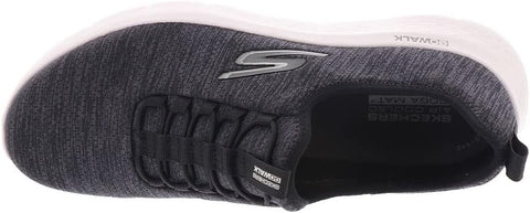 Gray athletic shoe with white sole on a black background