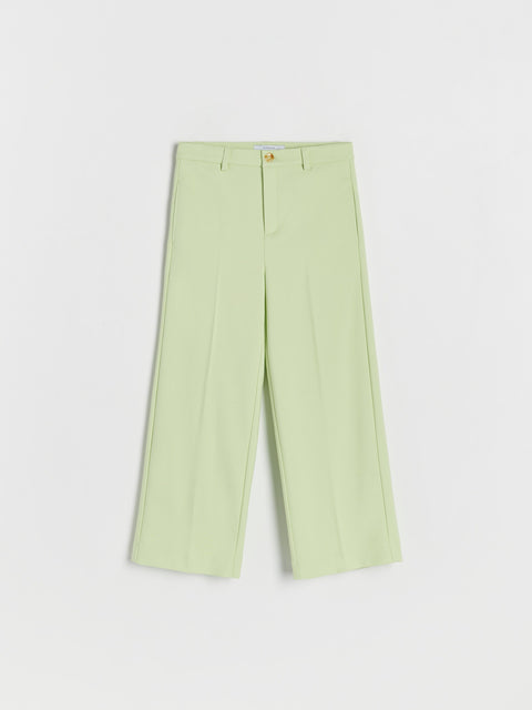 Light green pants on a white background