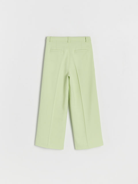 Light green pants on a white background