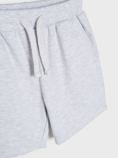 Light gray sweat shorts with a drawstring on a white background