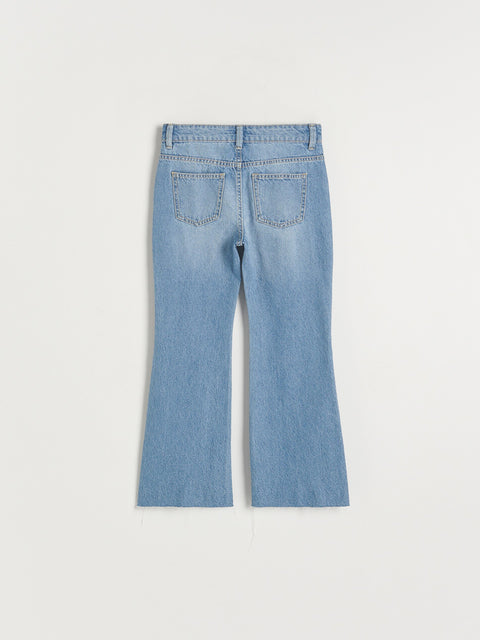 Light blue jeans on a white background