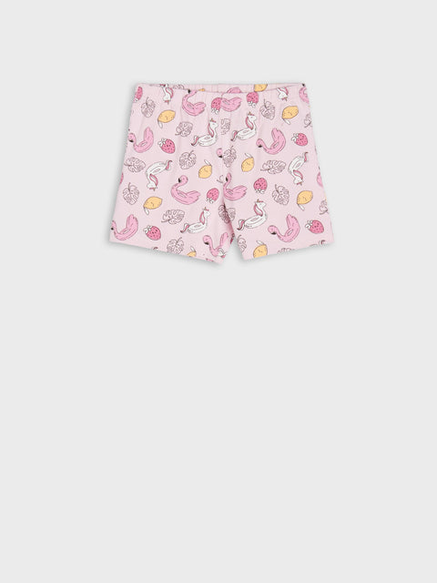 Pink shorts with cartoon print on a white background