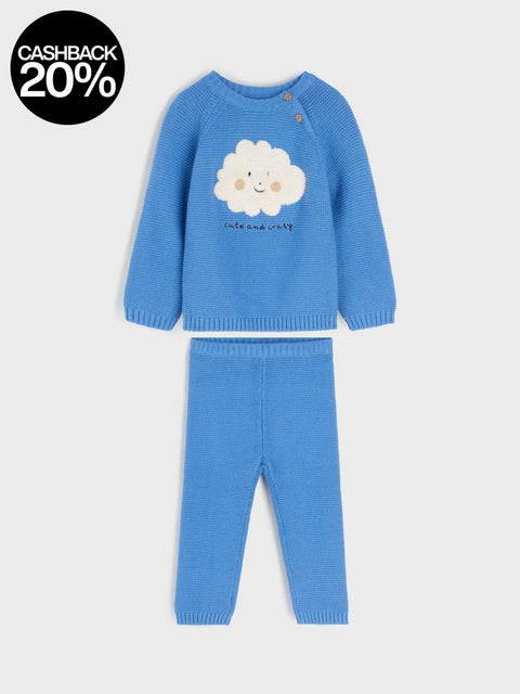 Blue knitted outfit with a cloud design on a light gray background