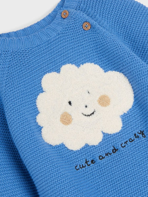 Blue knitted sweater with a white cloud design and text on a white background
