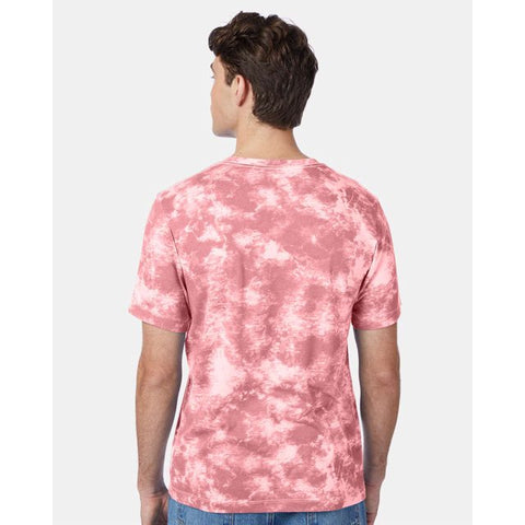 Person wearing a pink tie-dye t-shirt on a white background