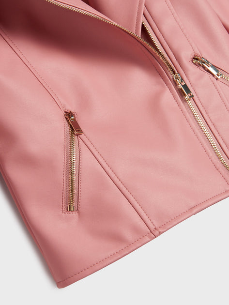 Close-up of a pink jacket with gold zippers on a white background