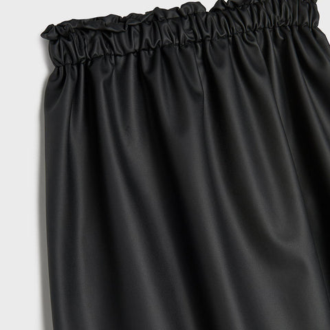 Black skirt on a light gray background