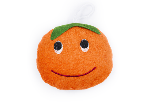 Plush toy shaped like an orange with a face on a white background