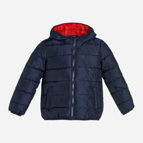 Navy blue puffer jacket with red interior on a white background