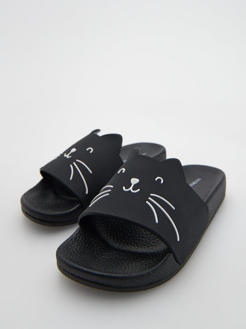 Black slides with cat face design on a light gray background