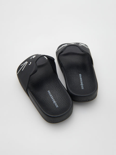 Black slides with brand logo on a white background